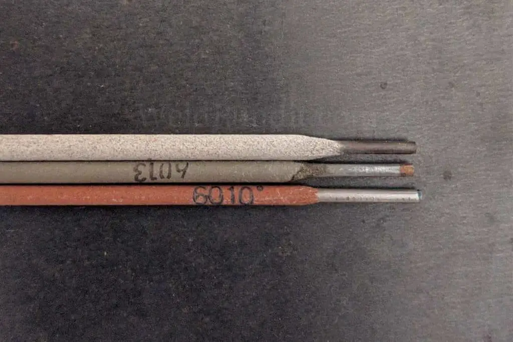 A photo of stick welding electrodes with same wire diameter but different total thicknesses