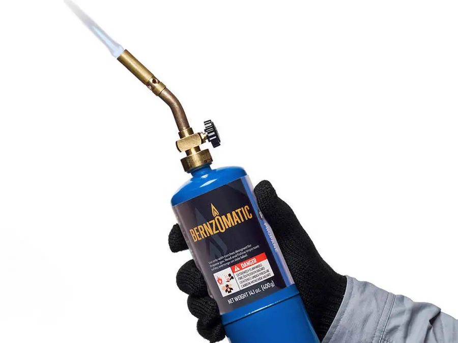 A photo of a flame torch