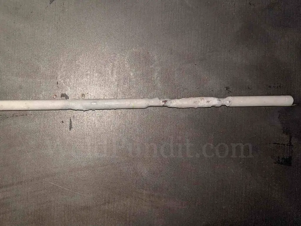 A photo of an E4043 stick welding electrode with damaged flux